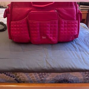 Lug, red baby carry all bag never used